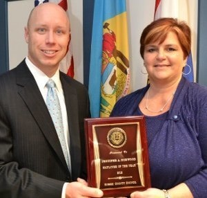 County Administrator Todd Lawson with 2013 Employee of the Year Jennifer Norwood